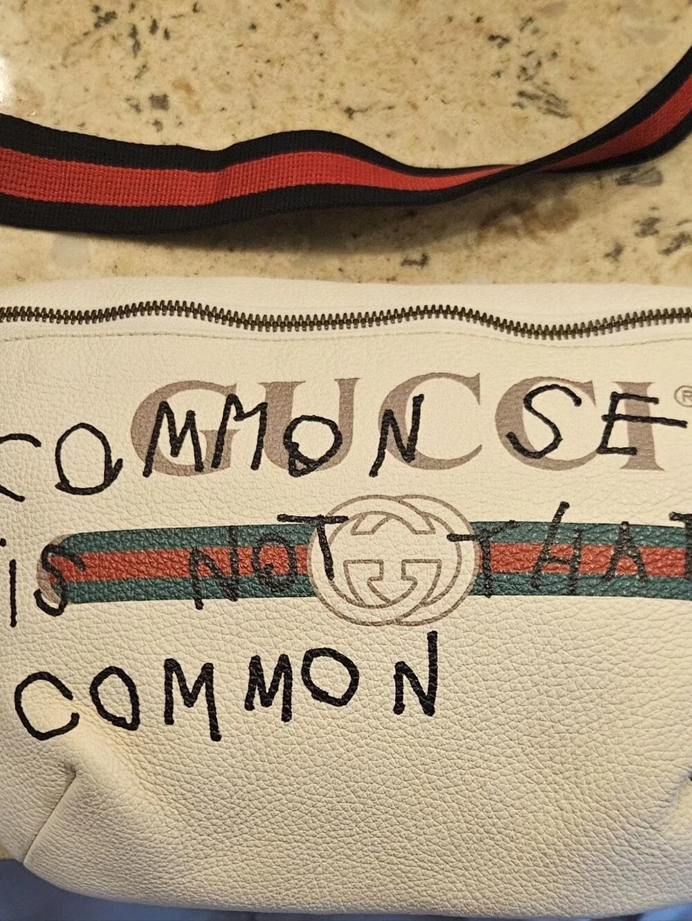 Gucci Beige Leather Belt Bag with 'Common Sense' Graphic